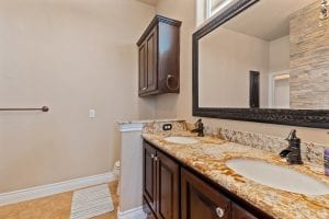 Rental house bathroom with double sinks